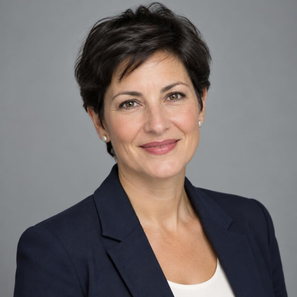 Studio portrait of a woman in her 40s with short dark hair